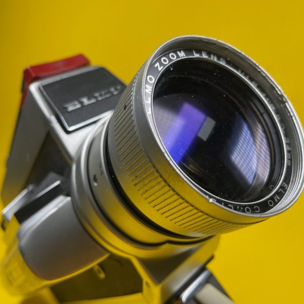 Caméra Super 8 d'occasion : ELMO SUPER 104 en très bon état / Elmo Zoom f: 1.8 \ F: 8.5-34 mm BACK TO SUPER 8